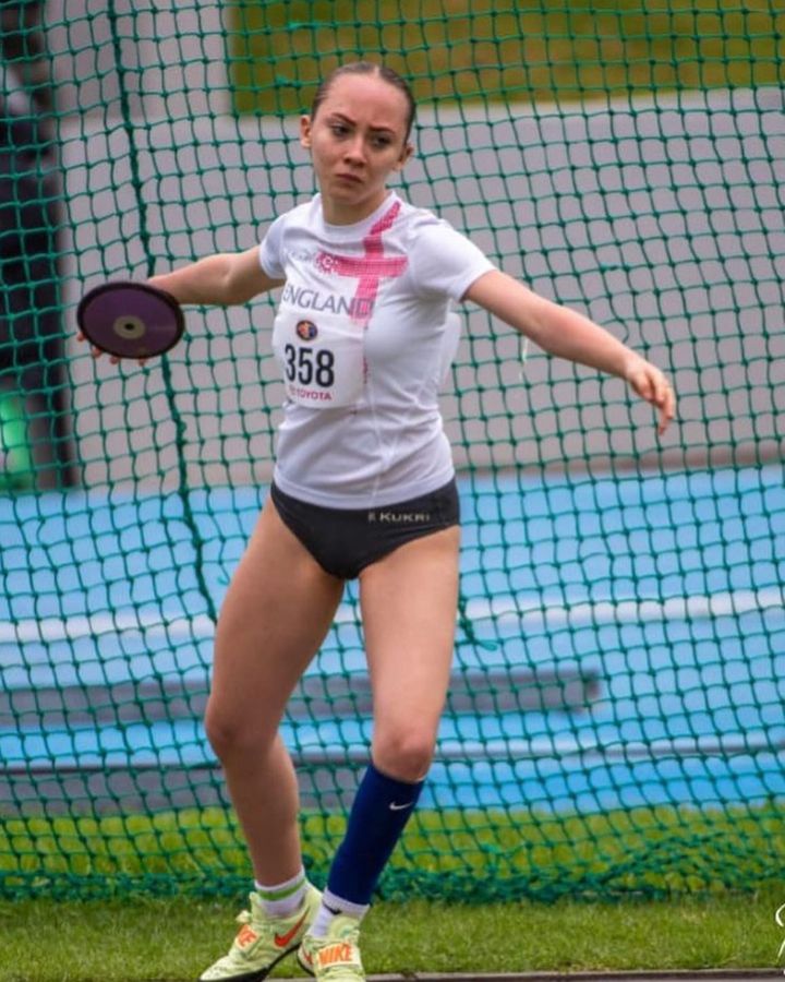 Para athlete Bebe Jackson competing in discus event wearing her carbon fibre orthotic splint